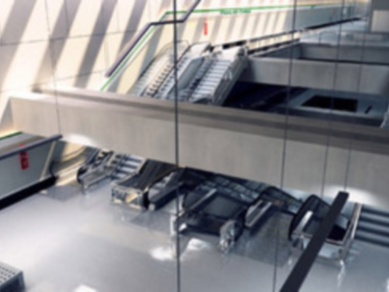 Un interior futurista de un edificio con escaleras y ascensores.