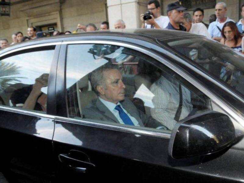 Ortega Cano reaparecio para declarar ante el juez  sereno, vestido de chaqueta y corbata , convaleciente y en silla de ruedas junto a su hijo Jose Fernando  