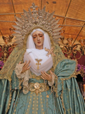 La procesión de todo un barrio por el Cristo de la Caridad de la barriada de los Príncipes.